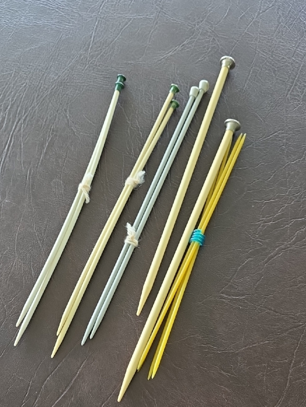 Vintage Double-Pointed Knitting Needles Set in Pale Yellow, Cream, and Mint